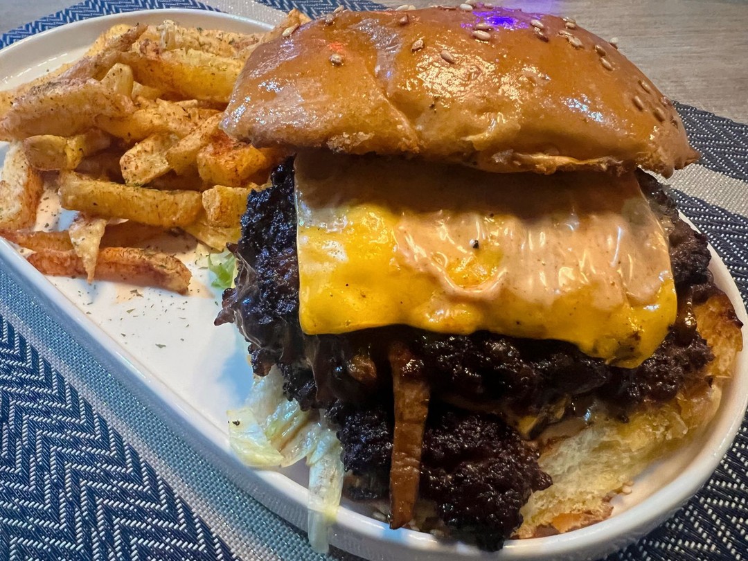 Our Search for the Best Burger led us to the Phantom Burger at @smylies_za . Hit the spot today.2 patties, braised pulled brisket, lettuce, onions, tomato,gherkins and in house sauce with cheese #halaal#burgers #burgertime #gourmetburgers #phamtomburger