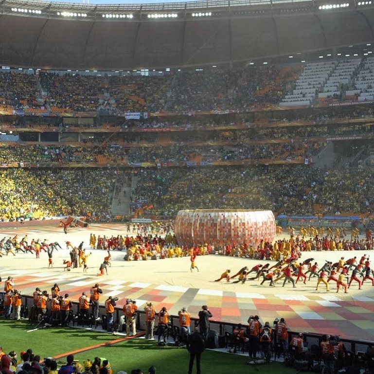 Day 1-Opening Game and South Africa vs Mexico The Build Up, The partying with the fans and the Mexicans in Sandton.2010 IS HERE and to be a part of the opening ceremony was freakin fantastic. To watch your country play the opening game of a World Cup Final..truely special. The atmosphere was amazing. My first visit to Soccer City also fantastic.The Stadium or Calabash is a cauldron.You feel close to the pitch.As  a footie fan The thought of being so involved in a World Cup is mnd blowing.People can call me crazy or a lunatic or obsessive. In the Words of Bill Shankley. “Football is not about life and death.Its more than that”This is the World Cup,The Pinnacle of every fan and I intend to make the best of it.This is what i have waited for.