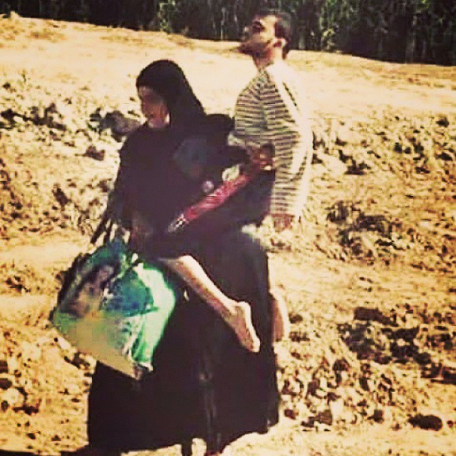 One of the most inspiring, touching and beautifully melancholic mages Ive ever seen. the epitome of motherhood. an Iraqi mother holding up her handicapped growing son making it look effortless to reflect an image of unimaginable strength. Happy mothers Day