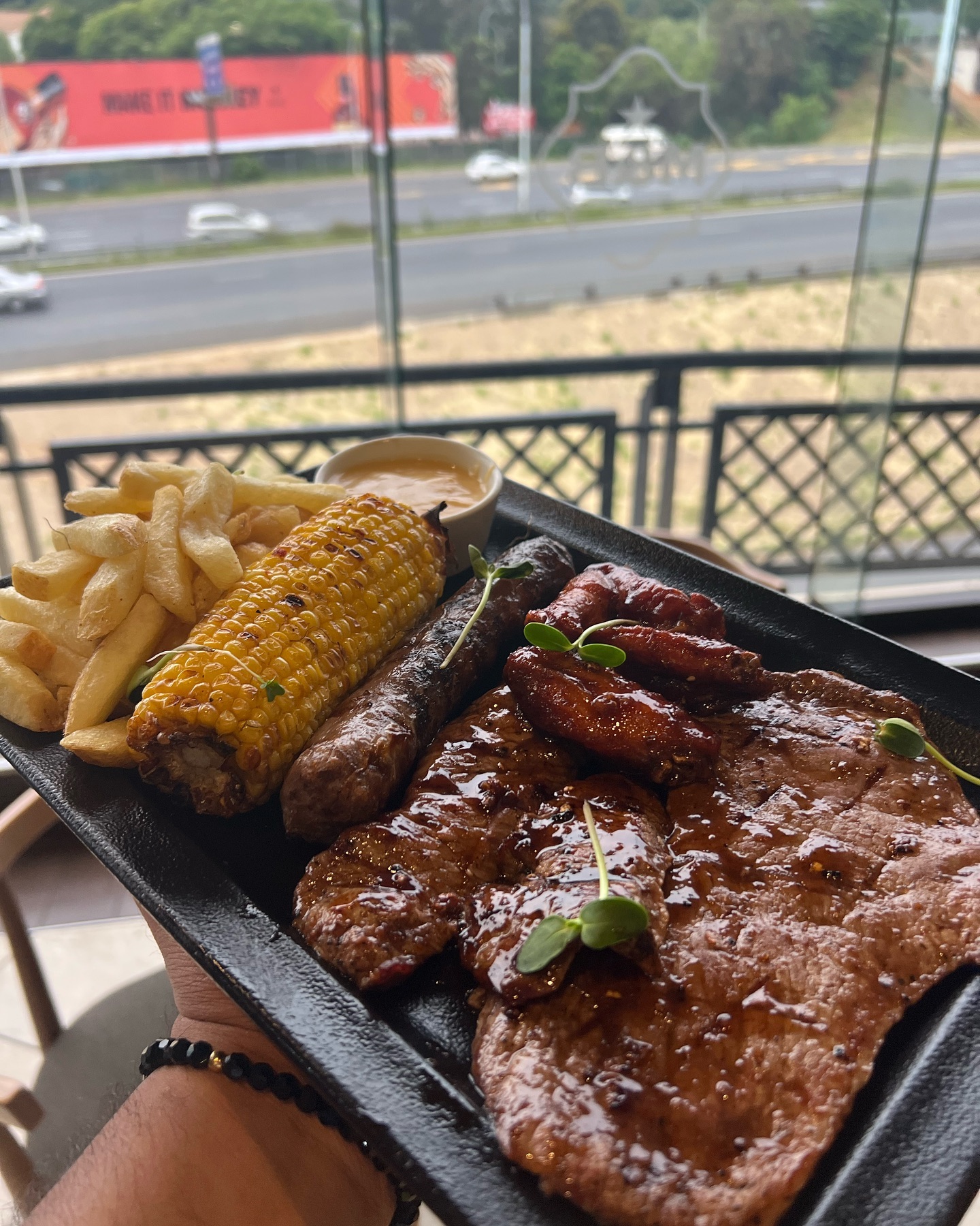 The Pit Boss Platter at Mugg and Bean Killarney Mall #Halaal. 120g steak, Beef rashers,wors,BBQ Wings, chips and a corn on the Cob @muggandbean_killarney#pitbossplatter #meatplatter #steak #muggandbeankillarney #muggandbean #killarneymall