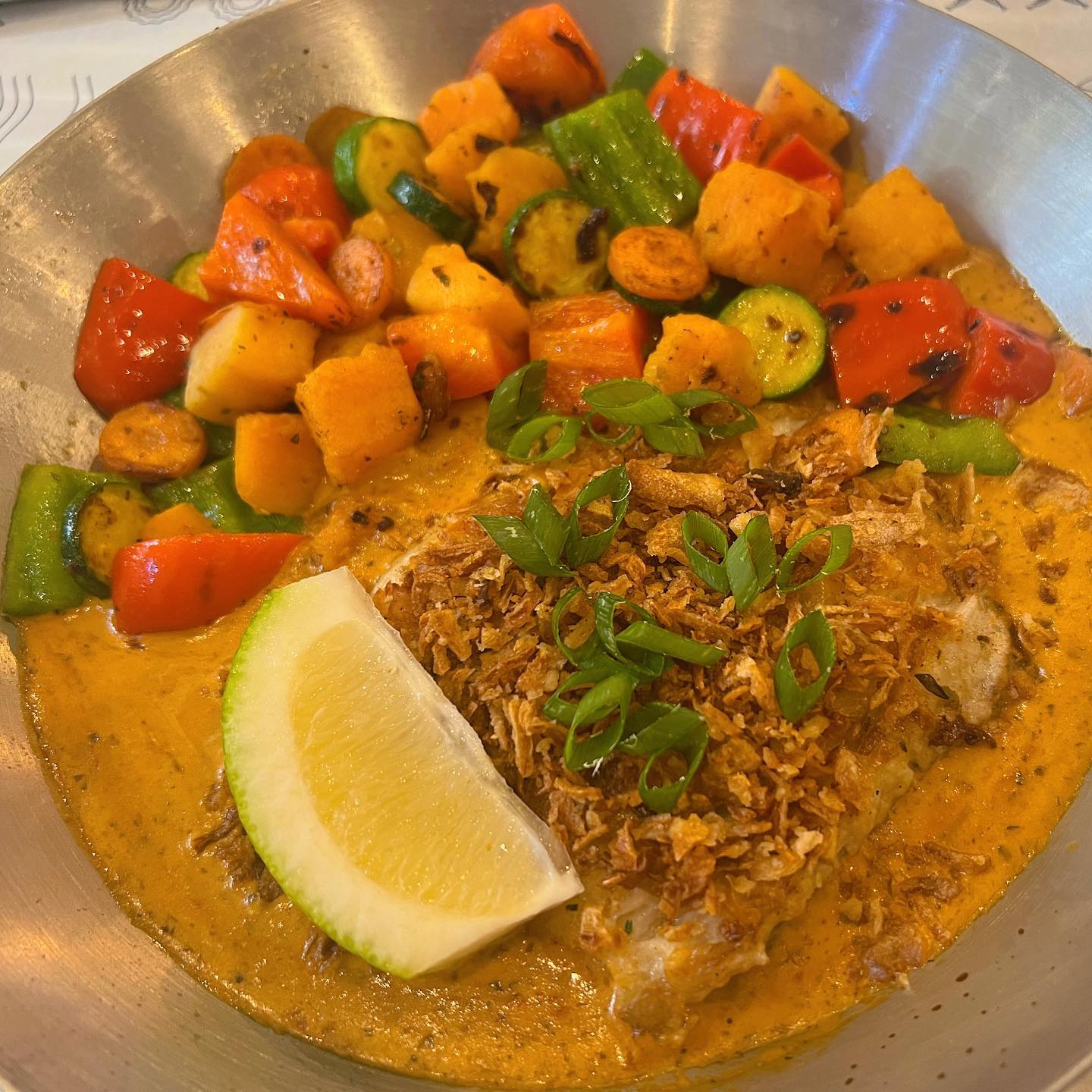 Spicy Crusted Yellow Tail with veges at @oceanbasket_killarney . Exclusive to Ltd Stores OnlyGrilled the OB Way and topped with paprika onion panko crumb and creamy spiced garlic sauce. Served with a side of your choice#fish #oceanbasket #halaaloceanbasket #yellowtail #oceanbasketkillarney