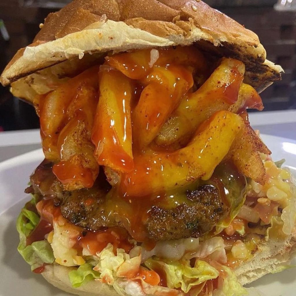 How do you like your Burgers? In the pics we have a Texan Burger from Ackhalwayas Robertsham And a Chilli Cheese Bomb. Do you like your burgers Pimped up and Busy or just a ground Pattie with cheese and salads