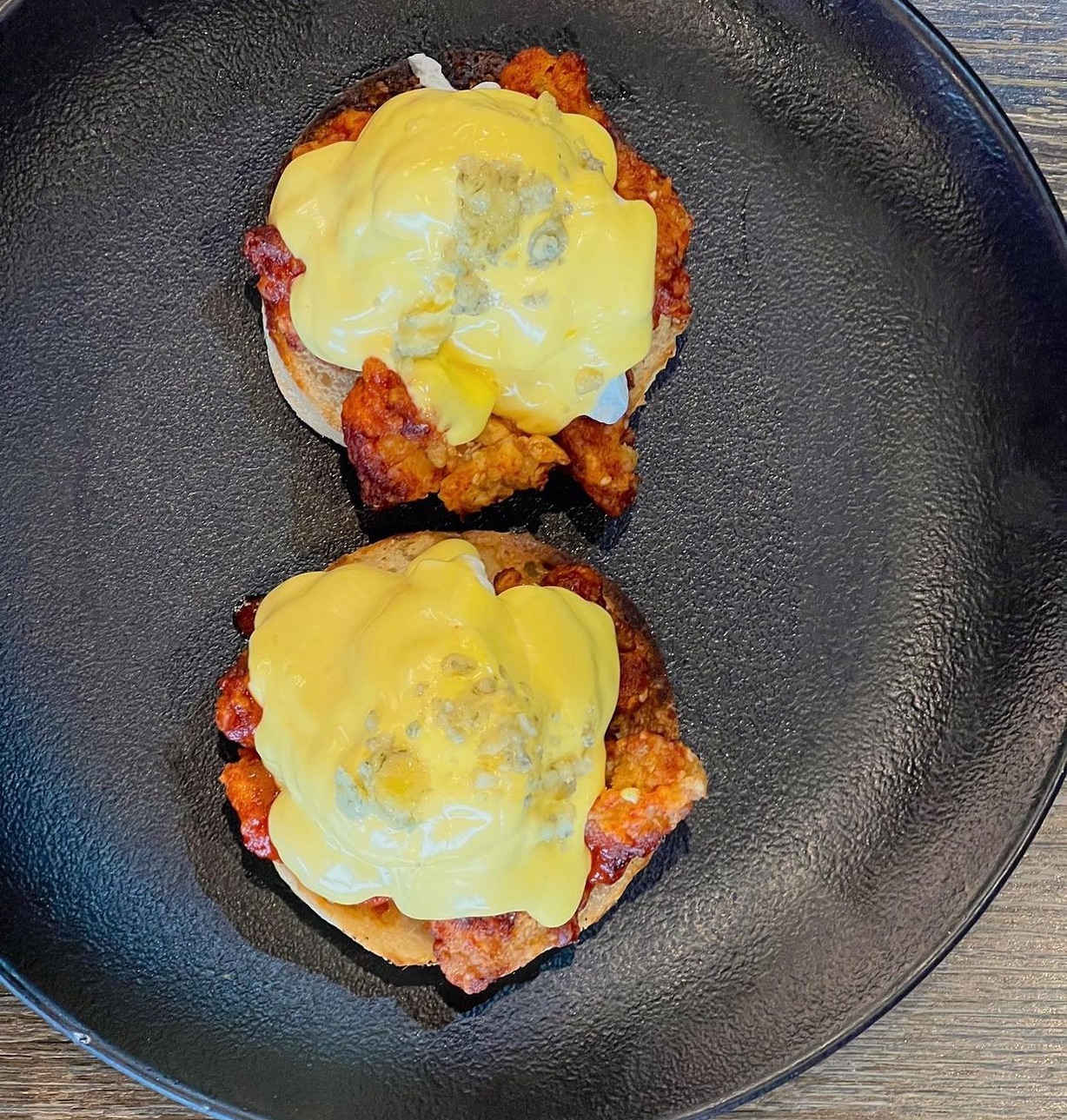 Buffalo Chicken and blue cheese eggs Benedict at @muggandbean_killarney #halaal. How do you like your eggs Benedict ?