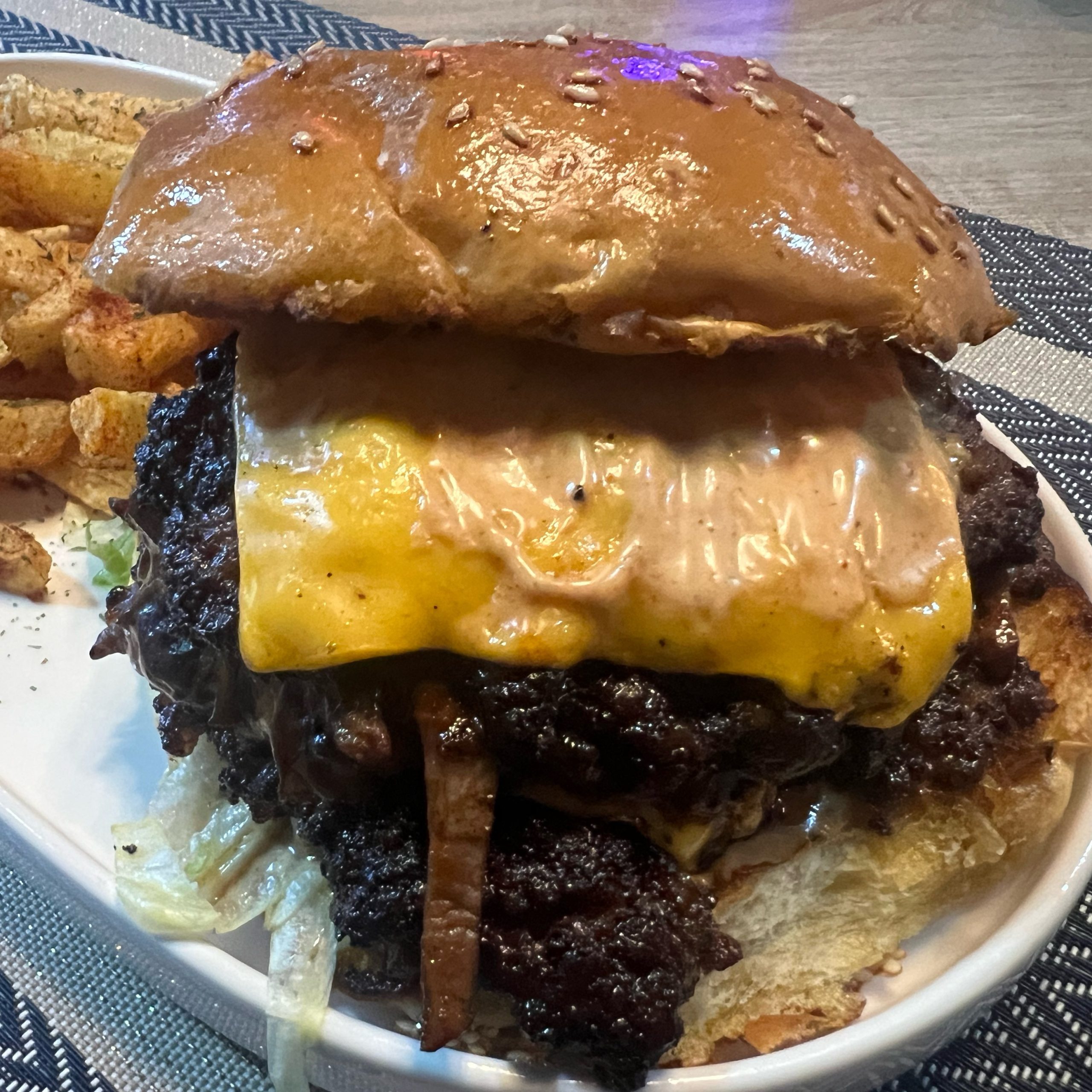 The Phantom Burger at @smylies_za ️. 2 patties, braised pulled brisket, lettuce, onions, tomato,gherkins and in house sauce with cheese #halaal#burgers #burgertime #gourmetburgers #phamtomburger