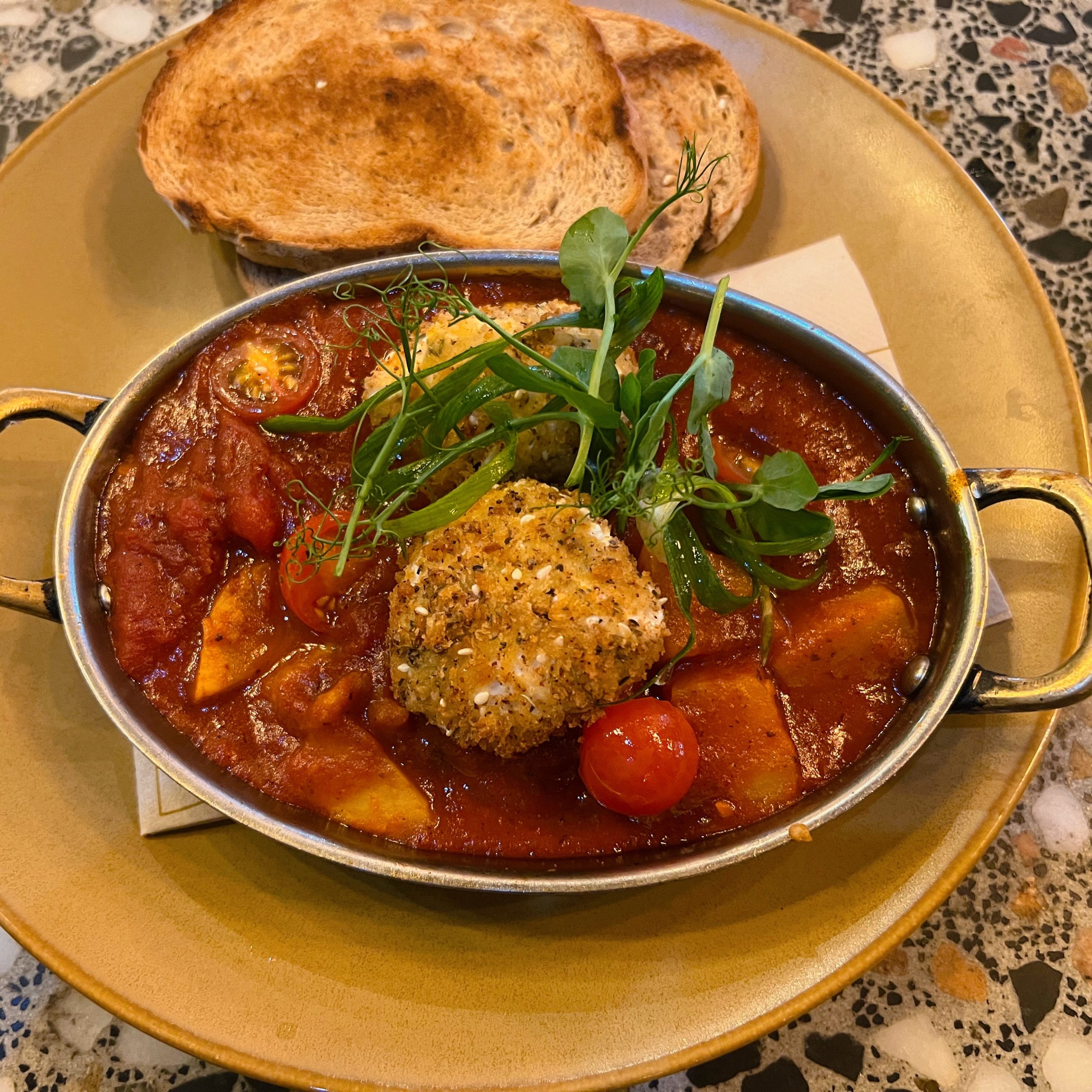 Red Shakshuka at @proudmary_sa . Zaater baked eggs, harissa roasted tomatoes,red peppers,sweet potato and onions
