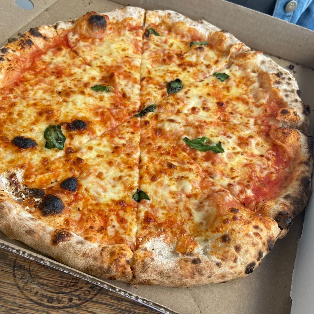 Margherita Pizza at @holydoughza in George. Nothing like a Margherita ️