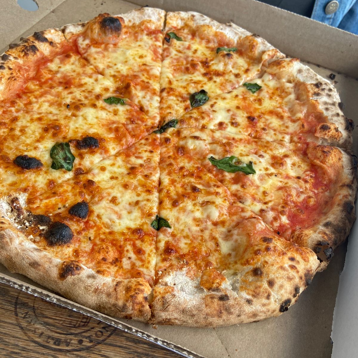 Margherita Pizza at @holydoughza in George. Nothing like a Margherita ️