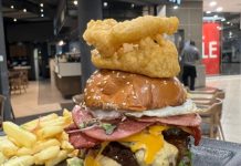 Knocked a Big Daddy Burger at Mugg and Bean Killarney since Im still here.Served on a sesame brioche bun°, with rosemary-salted skin-on fries, sweet potato fries or a side salad. Gherkins, tomato, burger mayo, red onion & lettuce. With a fried egg, beef macon, pastrami & cheddar. Topped with battered onion rings.#bestburger #bigdaddyburger #halaalmuggandbean #muggandbeankillarney #monsterburgers