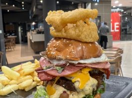 Knocked a Big Daddy Burger at Mugg and Bean Killarney since Im still here.Served on a sesame brioche bun°, with rosemary-salted skin-on fries, sweet potato fries or a side salad. Gherkins, tomato, burger mayo, red onion & lettuce. With a fried egg, beef macon, pastrami & cheddar. Topped with battered onion rings.#bestburger #bigdaddyburger #halaalmuggandbean #muggandbeankillarney #monsterburgers
