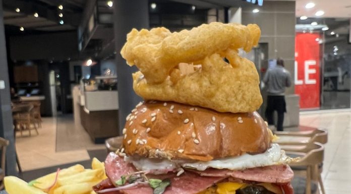 Knocked a Big Daddy Burger at Mugg and Bean Killarney since Im still here.Served on a sesame brioche bun°, with rosemary-salted skin-on fries, sweet potato fries or a side salad. Gherkins, tomato, burger mayo, red onion & lettuce. With a fried egg, beef macon, pastrami & cheddar. Topped with battered onion rings.#bestburger #bigdaddyburger #halaalmuggandbean #muggandbeankillarney #monsterburgers