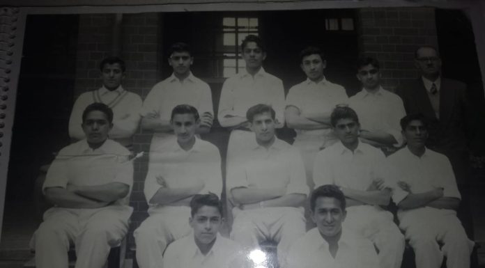 A Community cricket pic from the Past. Recognise Anybody